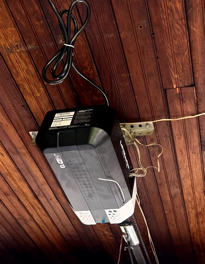 LiftMaster garage door opener photographed on a real Swift Garage Doors job