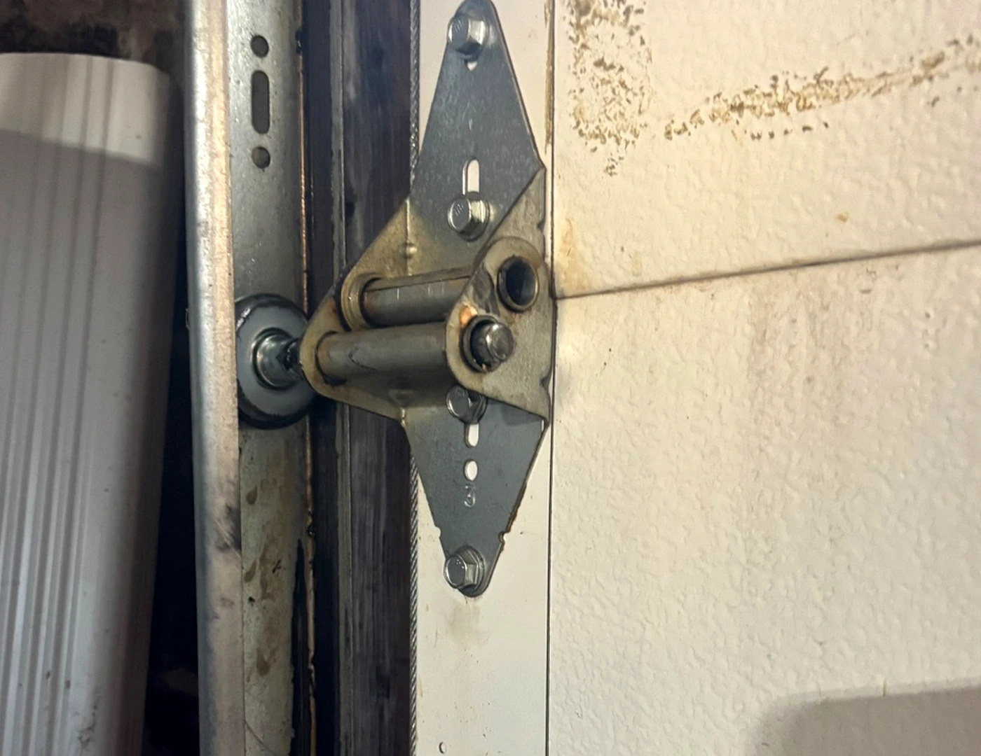 Garage door roller track and hardware from a real Swift Garage Doors job