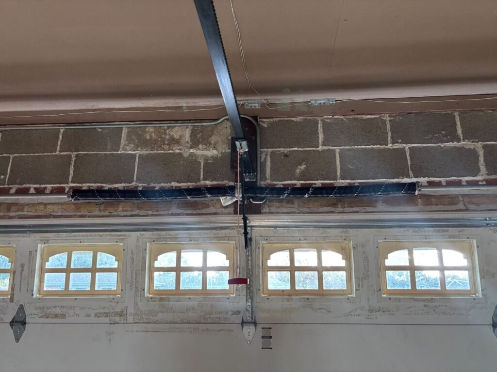 New garage door spring installed on a residential garage door in Niles, IL